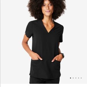 Figs scrubs Casma three-pocket scrub top.